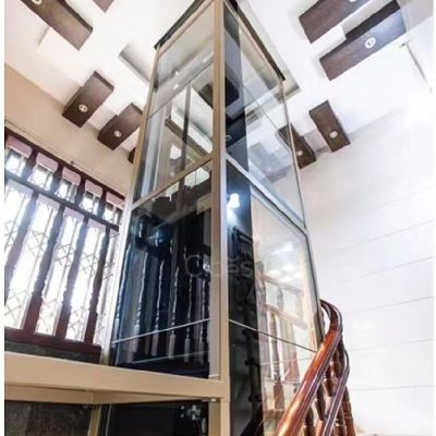 Elevador controlado por un microprocesador y accionado por un tornillo Bajo mantenimiento Hasta 15 M