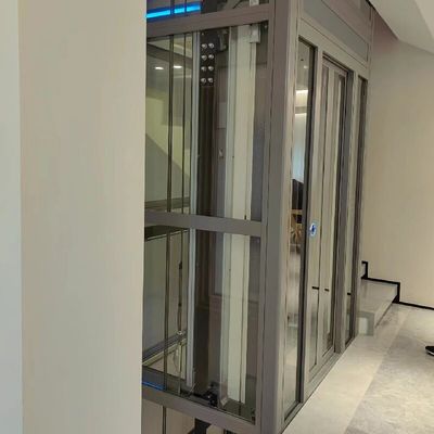 Elevador para el hogar de tracción con altura de viaje de 30 metros impulsado por un sistema de tracción sin engranajes Certificado ISO9001